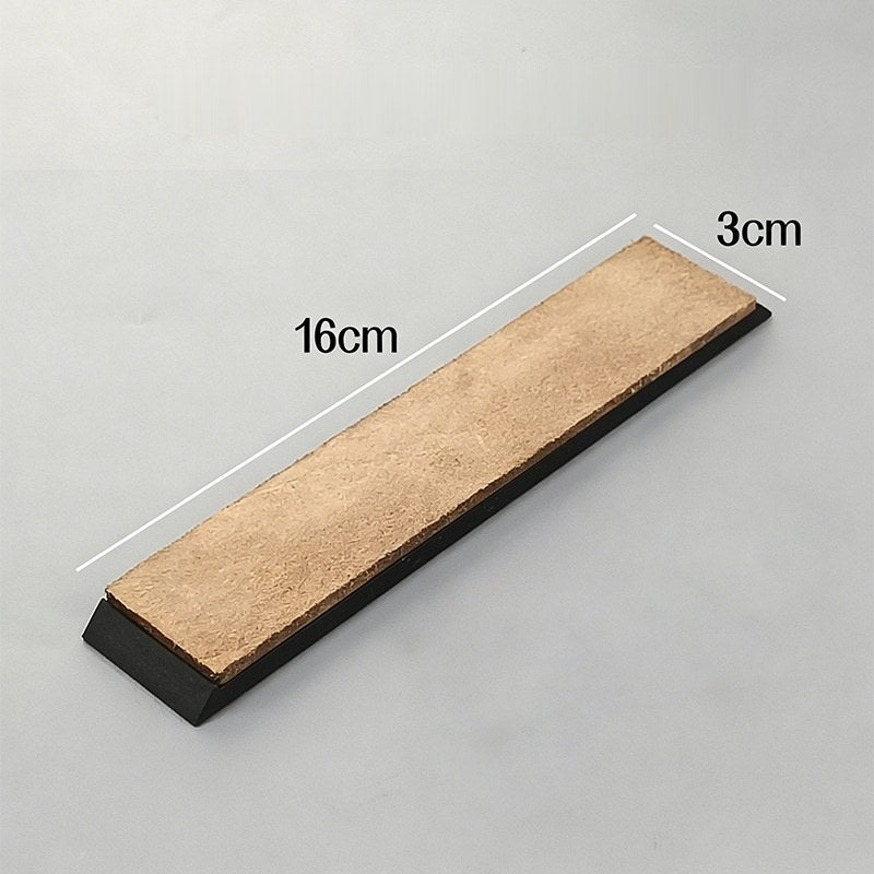 The leather strop on its angled black base, shown without the compound, with 16 cm and 3 cm size labels