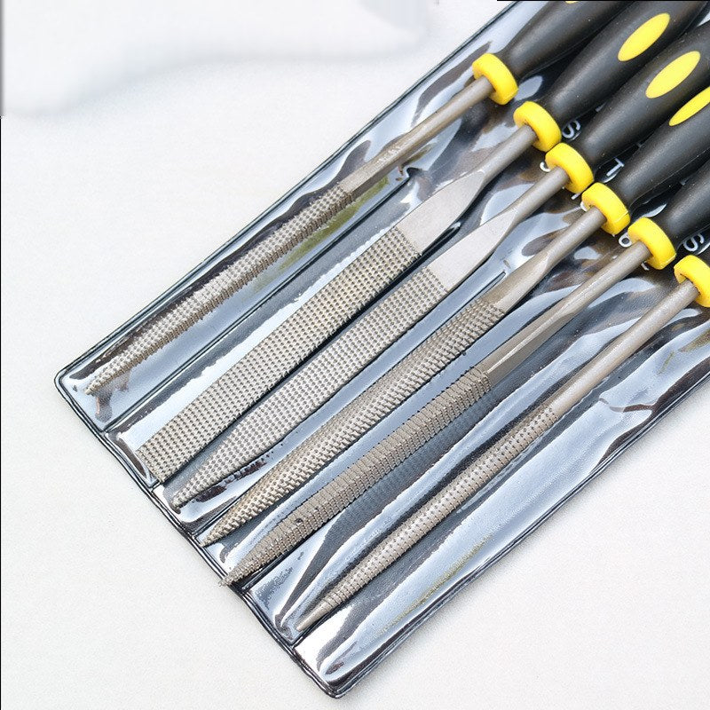 Six needle files in their clear plastic sleeve, one file per pocket, with the coarse teeth visible